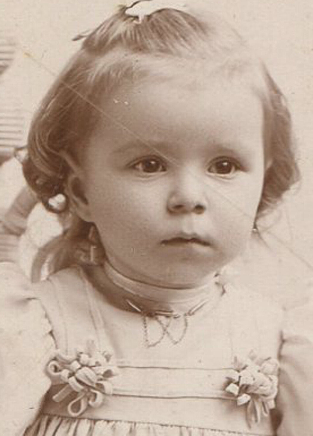 TODDLER TEETERING ON CHAIR. CABINET CARD. LIMA, OHIO.