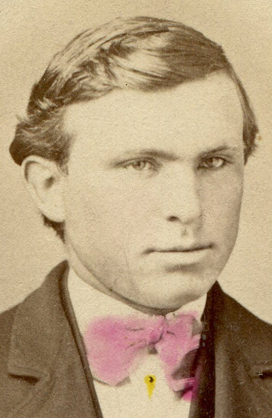 MAN WITH FURROWED BROW AND PINK TINTED BOW TIE. CDV, ALLEGHENY, PA.