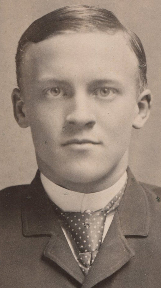 YOUNG MAN IN NICE SUIT WITH POLKA DOT TIE. CABINET CARD.