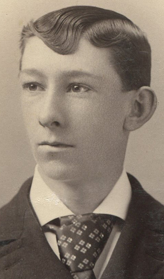BLAND YOUNG  MAN, PATTERNED TIE. CABINET CARD. WATERBURY, CONN.