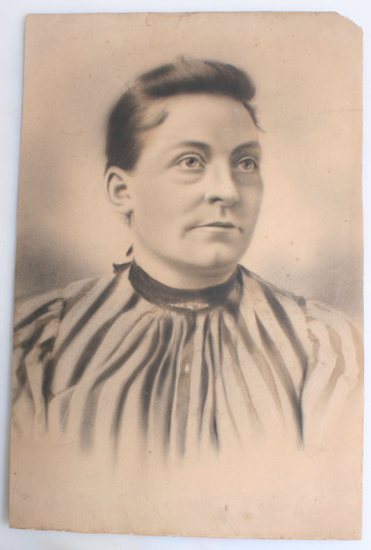 WOMAN WITH BIG EYES AND STRIPED DRESS. SALT PRINT, HAND TINTED. 18 X 12 INCHES.