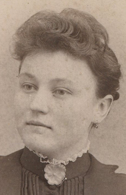 WOMAN WITH FABRIC POPPY FLOWER PIN. CABINET CARD.