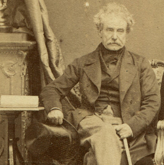 MAN W/TOP HAT AND CANE. CDV BY DISDERI, PARIS.