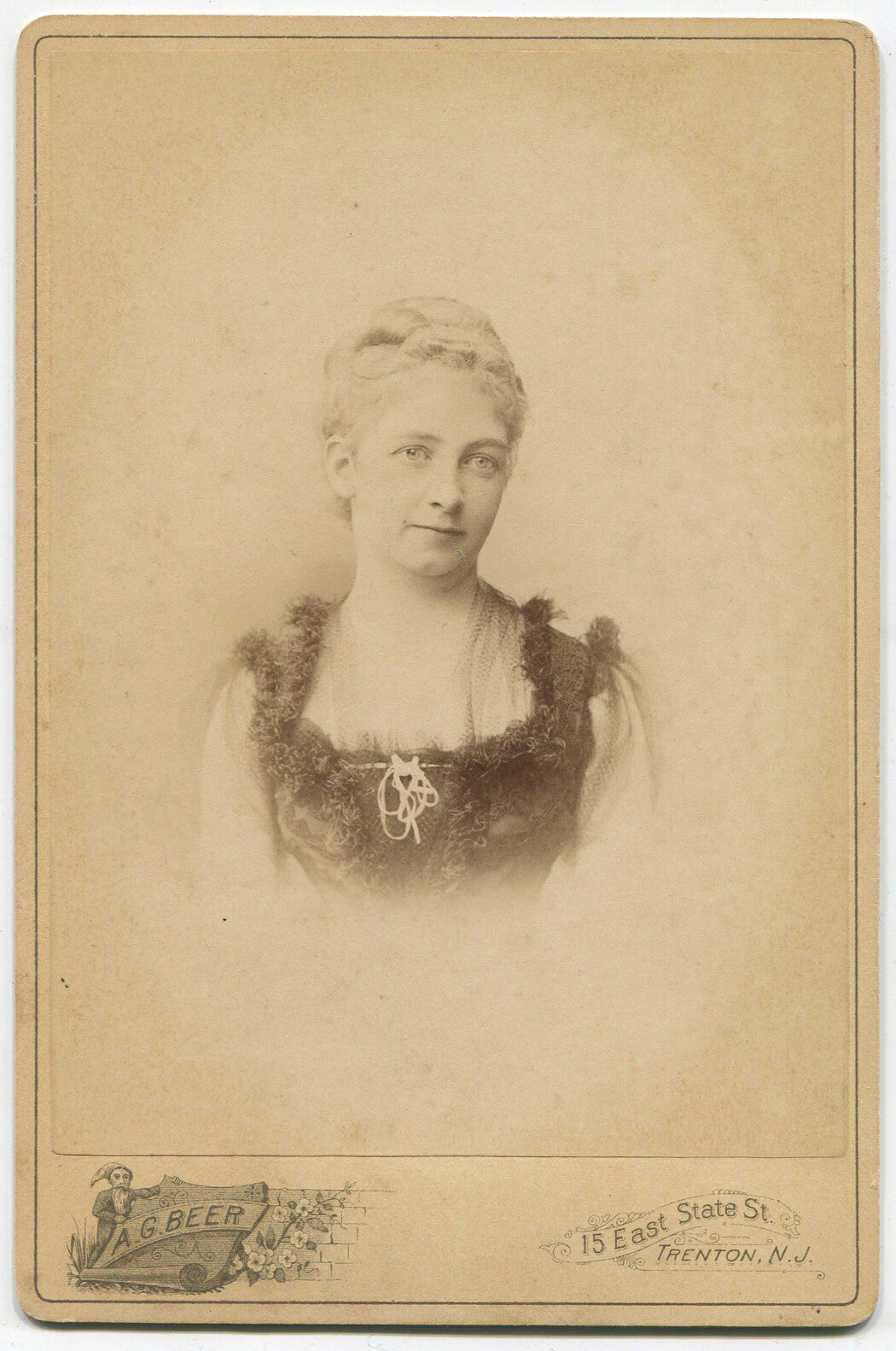 WOMAN IN FUR TRIMMED DRESS. CABINET CARD. TRENTON, N.J.