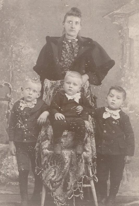 TIRED MOTHER W/ THREE YOUNG SONS. CABINET CARD.