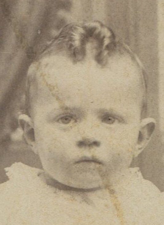 YOUNG CHILD W/TWO PRONOUNCED CURLS, LOOKING LIKE A BOSS. CABINET CARD. MISSOURI.