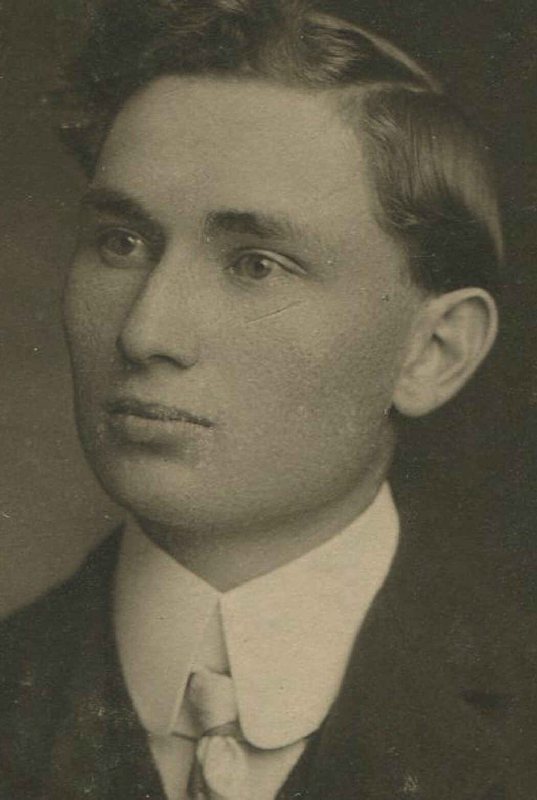Vintage photo Young Man with Wavy Bangs, High Stiff Collar - Marion, IN 1900, oval silver print on embossed card, 7x5