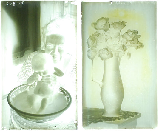 SET OF 2 1919 NEGATIVES ON GLASS OF WOMAN W/ BABY   FLOWERS IN VASE