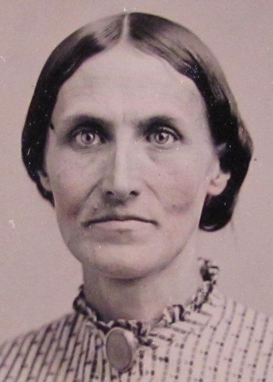 WOMAN, HIGH CHEEKBONES. TINTED 6TH PLATE TINTYPE, GLASS AND FOIL.