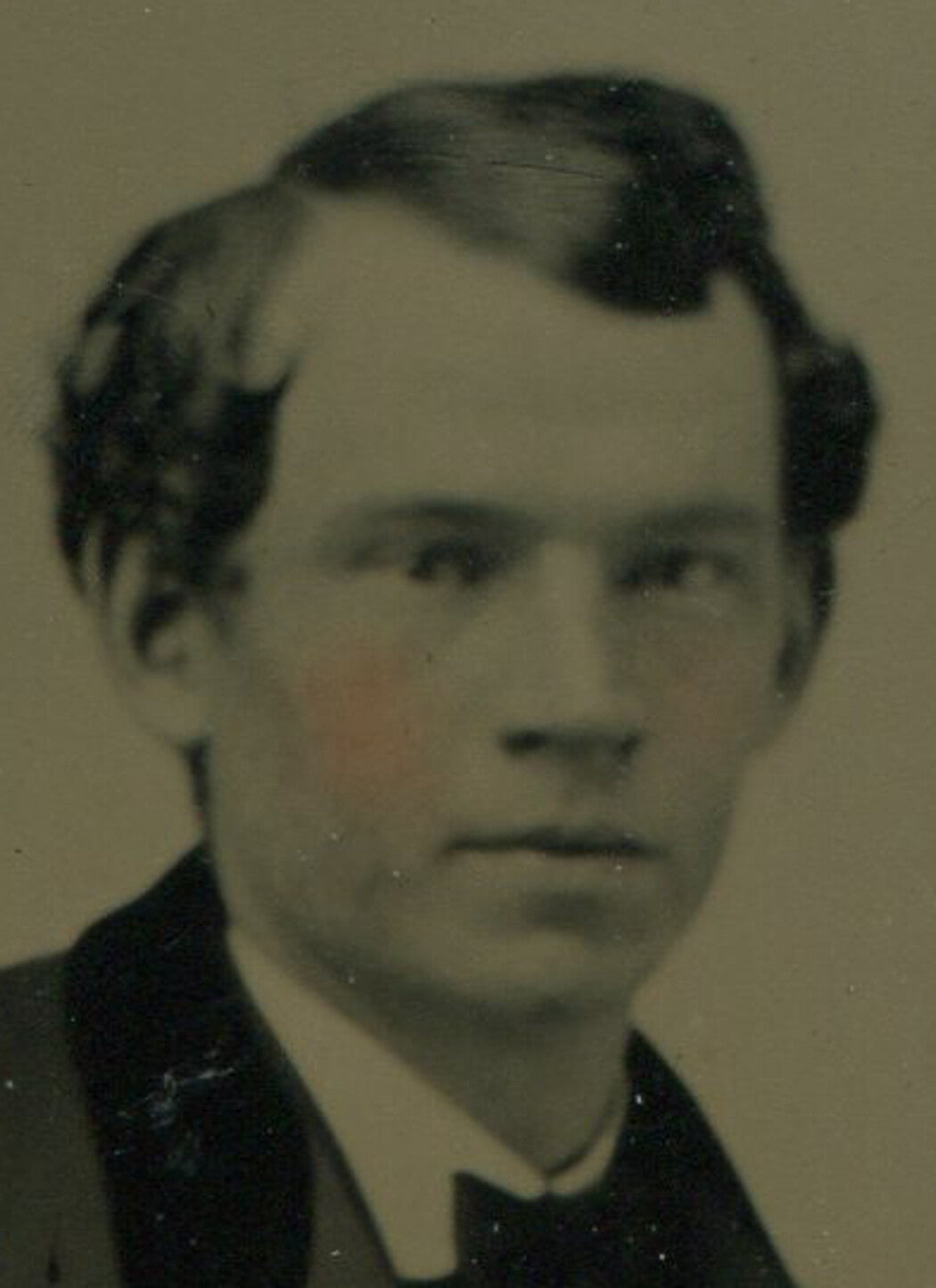 YOUNG MAN, VELVET COLLAR, BOW TIE. TINTED TINTYPE, PERIOD PAPER MAT.