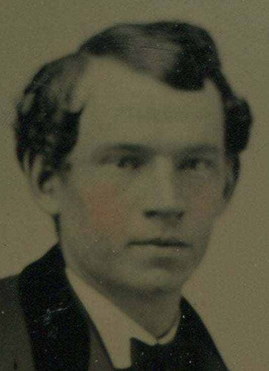 YOUNG MAN, VELVET COLLAR, BOW TIE. TINTED TINTYPE, PERIOD PAPER MAT.