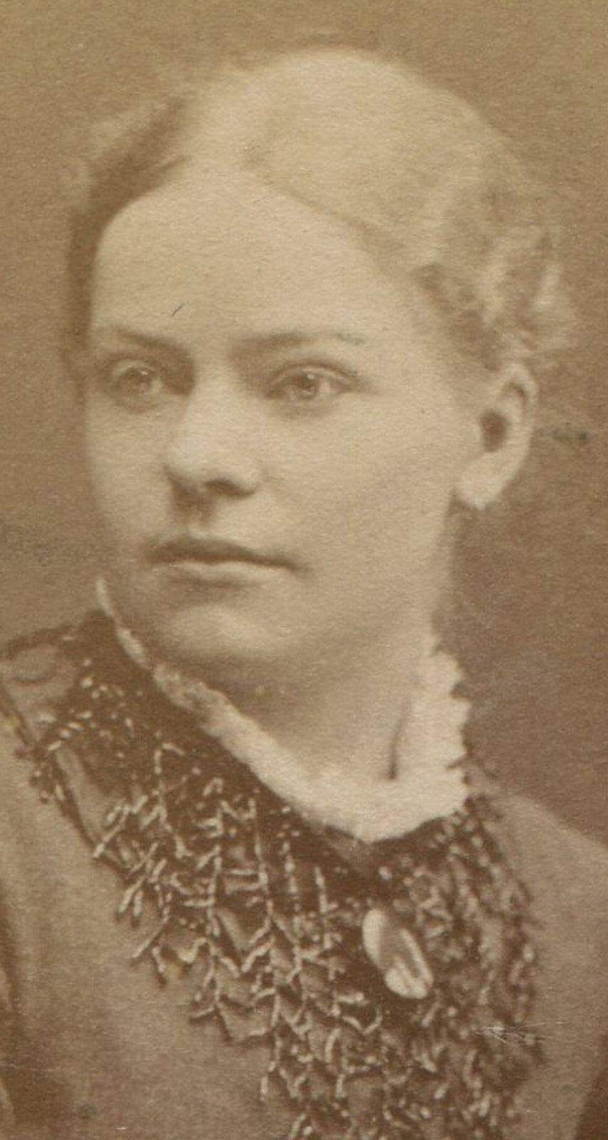 FINE FEATURED BEAUTY, HANDS RESTING ON TABLE. CDV. STOCKHOLM, SWEDEN.
