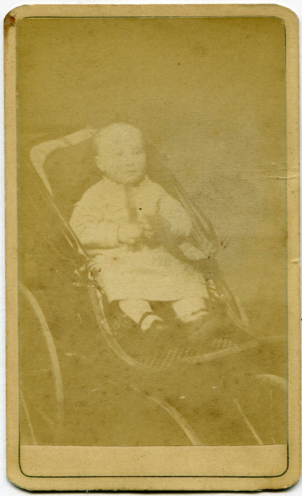 BABY HOLDING TOY, IN BABY BUGGY. CDV. SINCLAIRVILLE, N.Y.
