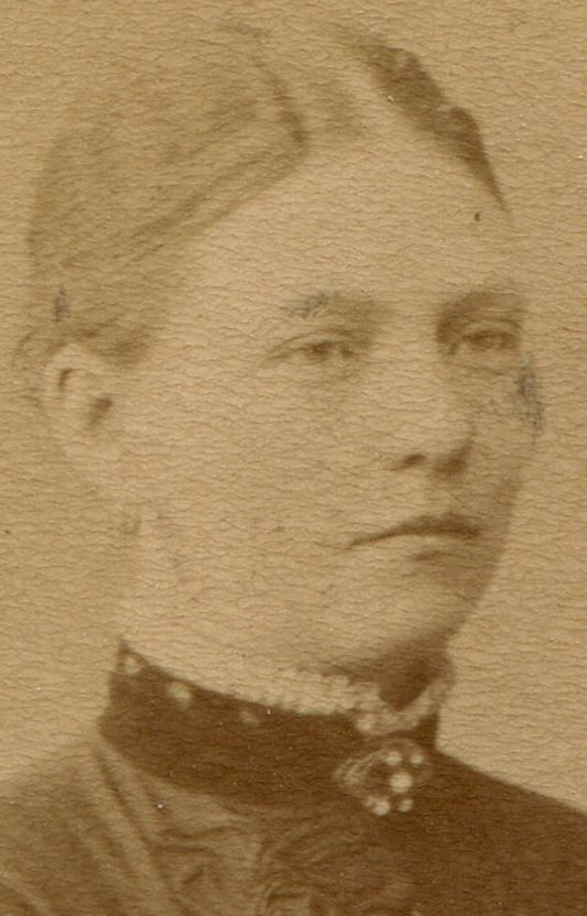 WOMAN, PENSIVE EXPRESSION, STANDING W/ HANDS AT REST ON CHAIR. CDV. STOCKHOLM.