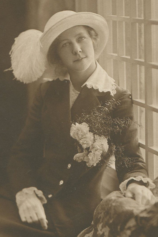 WOMAN, BATHED IN BEAUTIFUL LIGHT. TONED SILVER PRINT.
