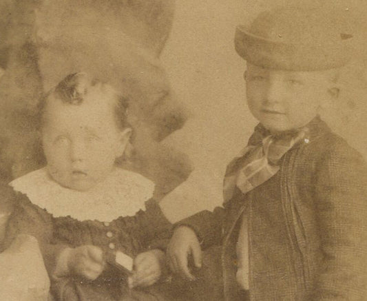 VERY YOUNG SIBLINGS PLOTTING THEIR NEXT MOVE. CABINET CARD. NAPERVILLE, ILL.