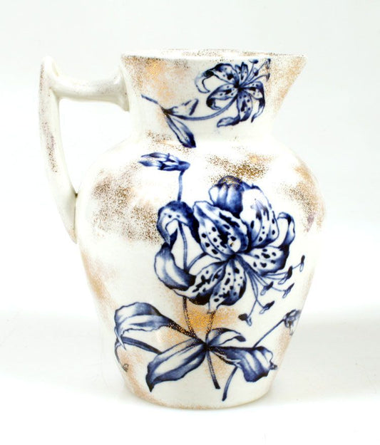 ANTIQUE POTTERY WATERING PITCHER, BLUE FLORAL DESIGN W/ SOME GOLD DUSTING