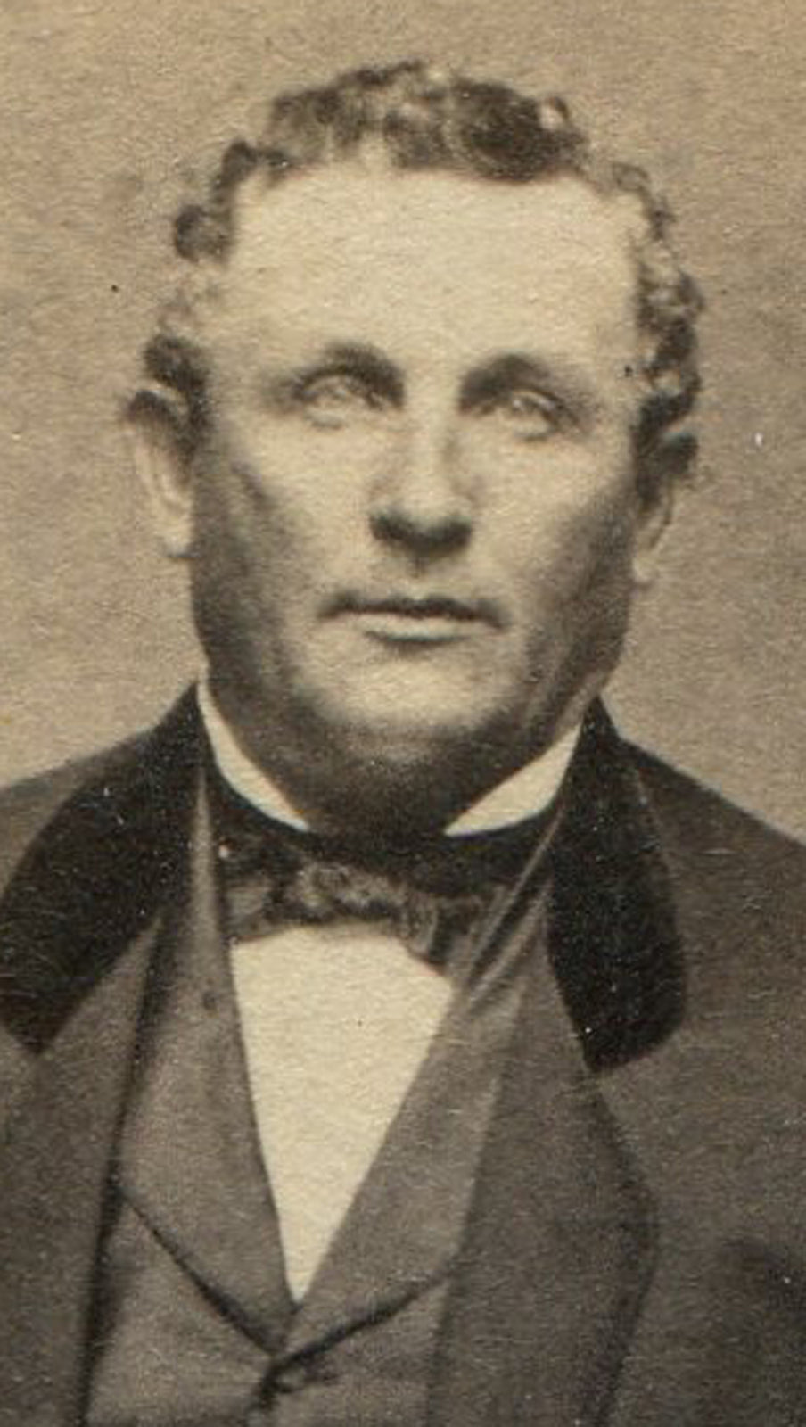 LARGE MAN WITH CURLY HAIR. RELAXED STANDING POSE. CDV. SPRINGFIELD, MASS.