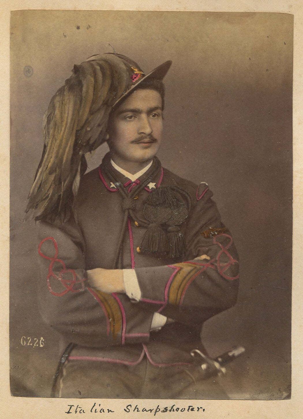 ITALIAN SHARPSHOOTER IN UNIFORM. BEAUTIFULLY TINTED ALBUMEN. 5.75X4 INCHES.1860