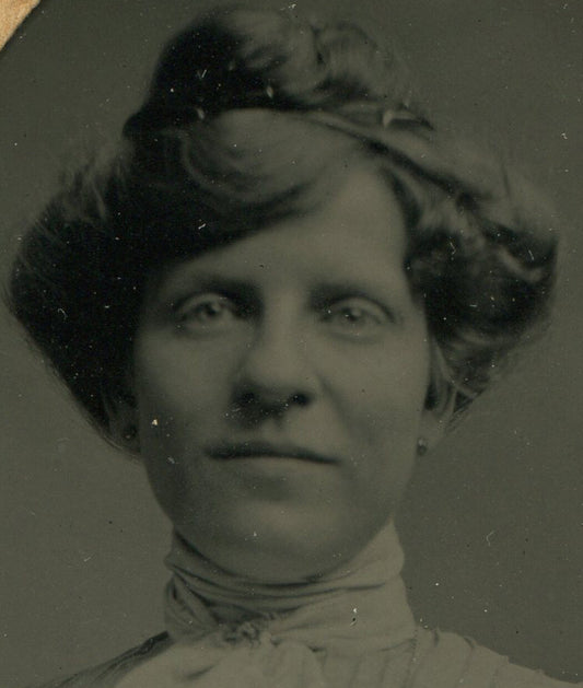 WOMAN, FRENCH BRAID, PLEATED TOP, BIG BOW TIE. TINTYPE, PERIOD PAPER MAT.