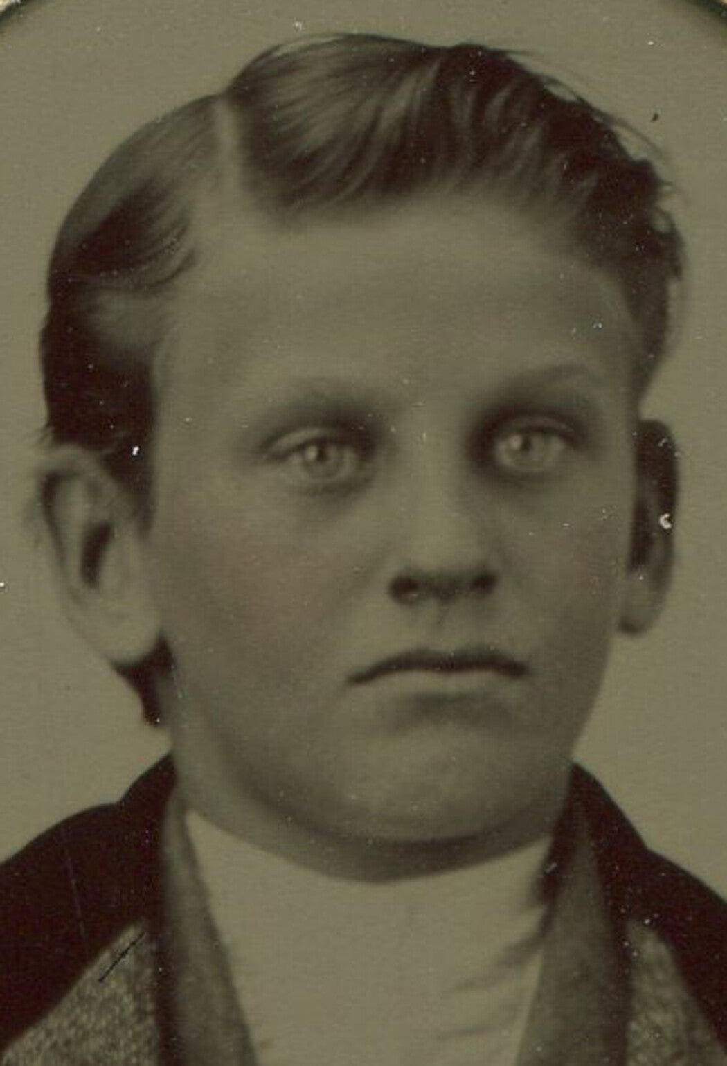 BOY IN VELVET TRIMMED SUIT. TINTED TINTYPE IN PERIOD PAPER MAT.