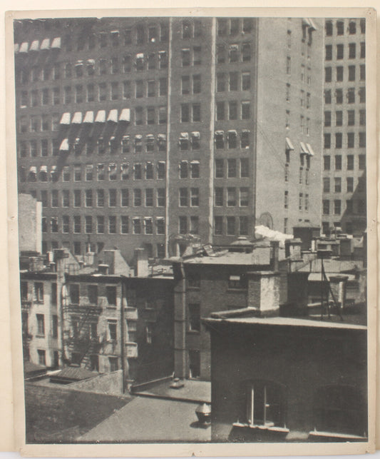 ARCHITECTURAL CHAOS, A JUMBLE OF BUILDINGS. 17 X 14 INCH SILVER PRINT.