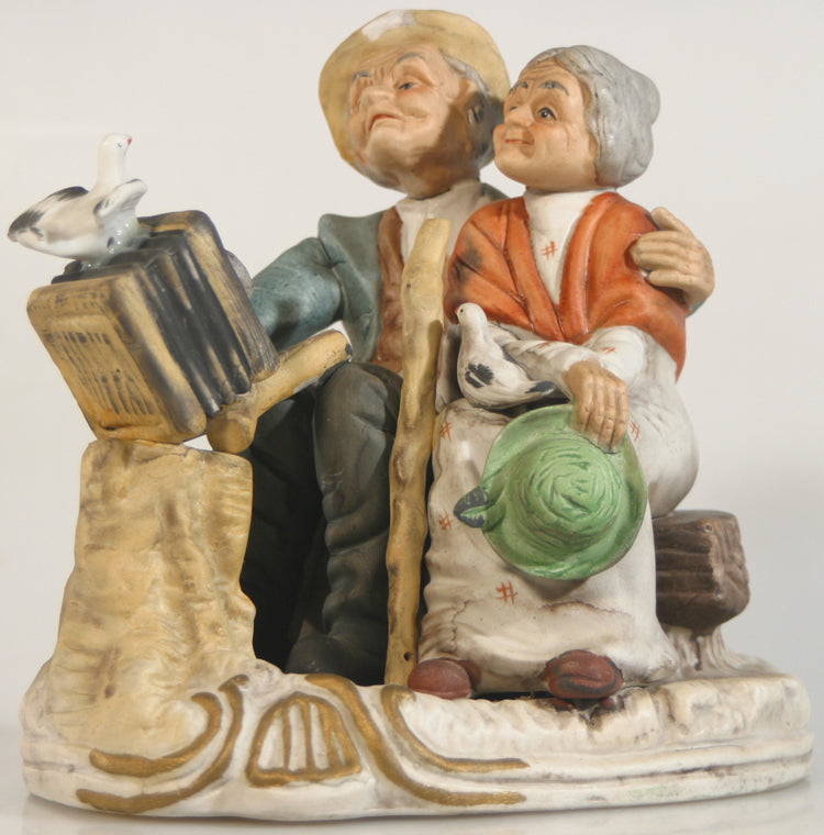 EDLERLY COUPLE WATCH THE BIRDIE PORCELINE FIGURE