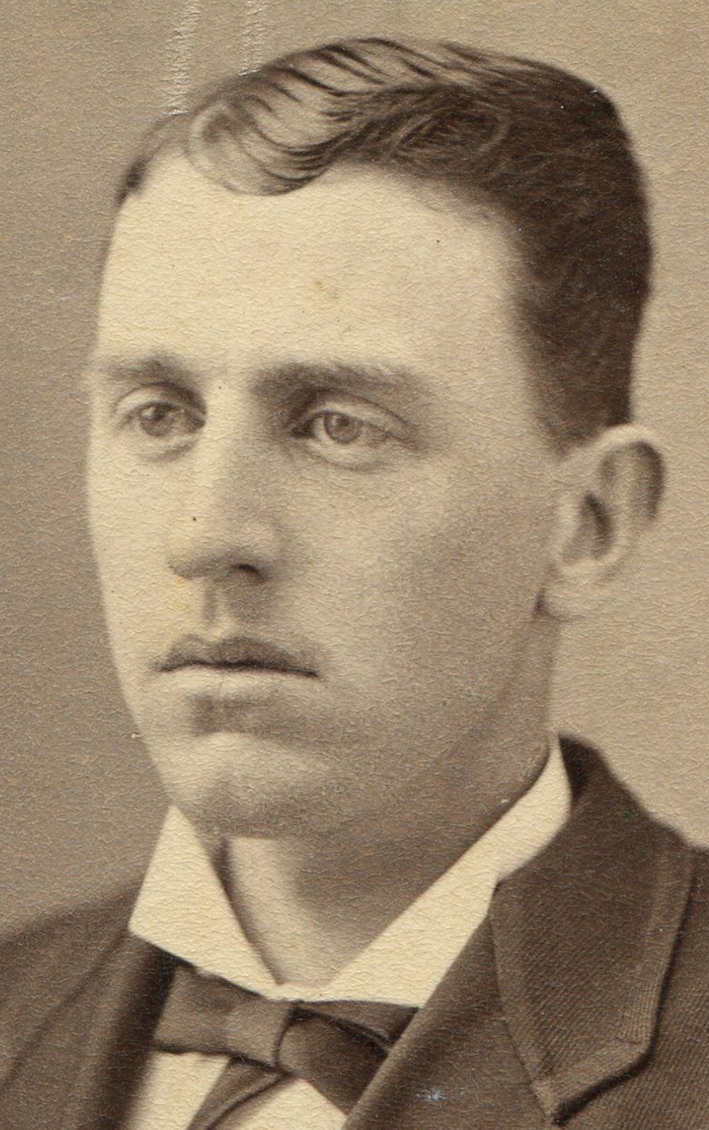 LONG FACED MAN, SUIT WITH TRIMMED LAPELS. CDV. ONCONIA, N.Y.