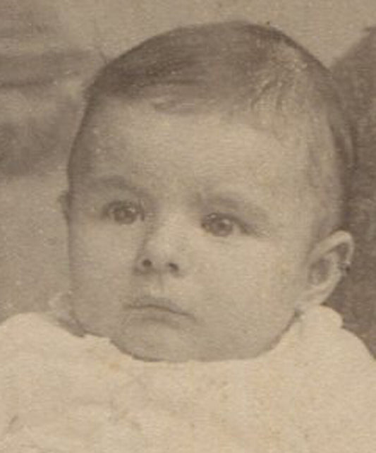 BABY WITH CONSTIPATED EXPRESSION. CABINET CARD. LANCASTER, PA.