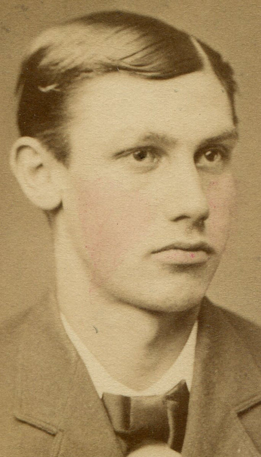 YOUNG MAN, FULL LIPS, TIGHT SUIT, BOW TIE. TINTED CDV.
