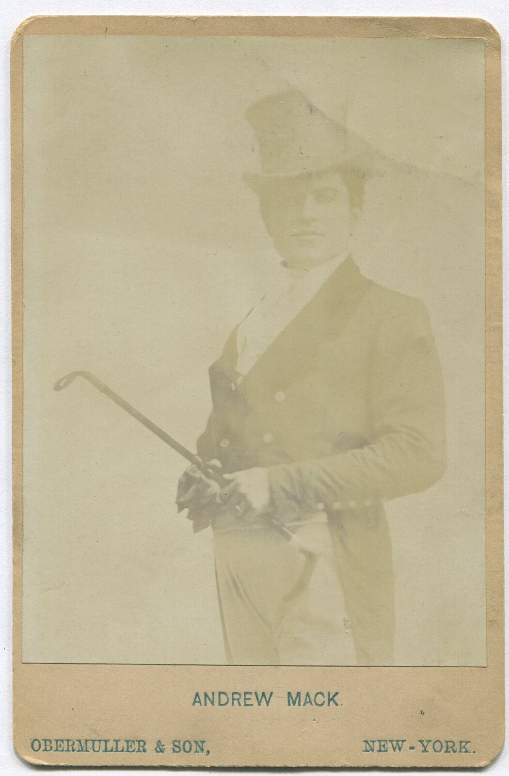 ANDREW MACK, ACTOR POSED HOLDING RIDING CROP. CABINET CARD.