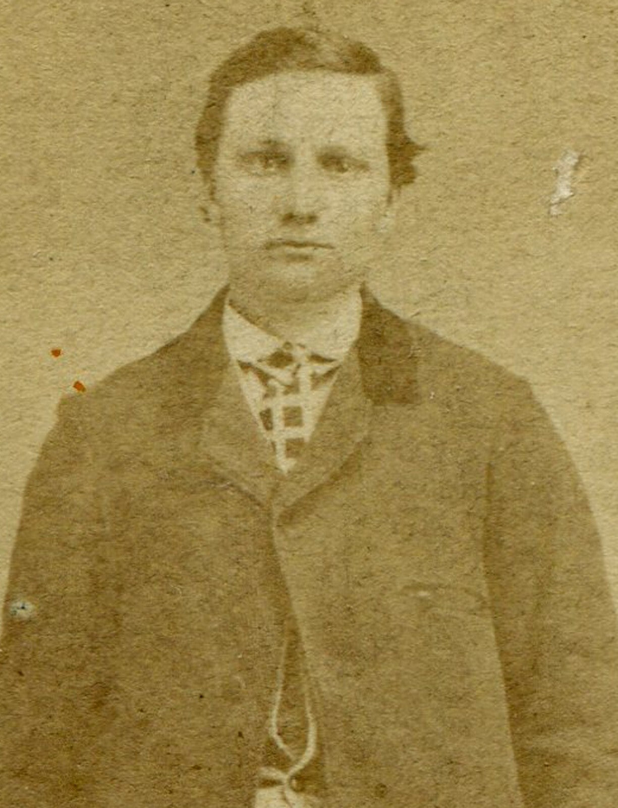 VERY TALL MAN, STANDING POSE, NEXT TO SMALL CHAIR. CDV.