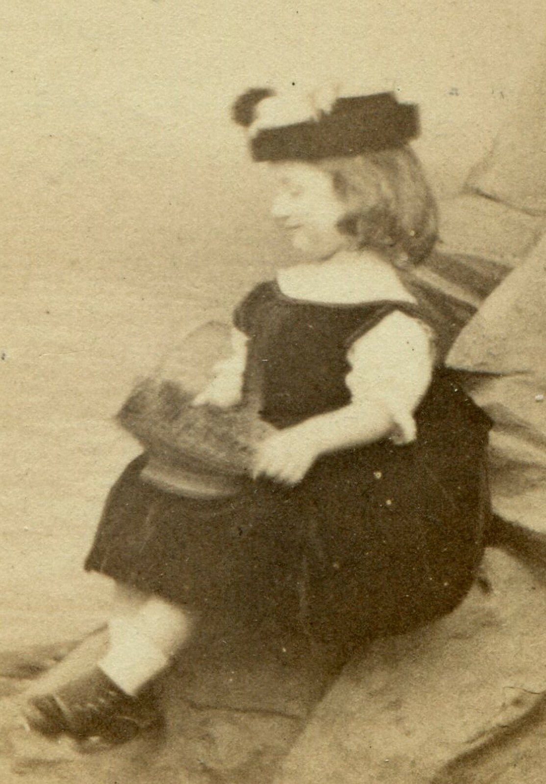 YOUNG GIRL POSED IN STUDIO SETTING/SITTING ON ROCKY BEACH. VERY UNIQUE. CDV.