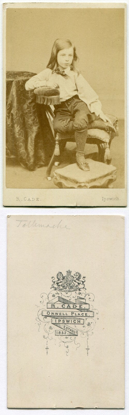 LONG HAIRED CHILD POSED ON CHAIR, HAND ON FOOT. CDV. IPSWICH, ENGLAND.