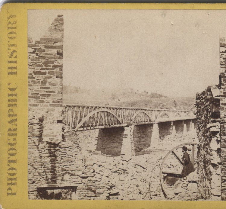Vintage Civil War era stereoview: Young man watching Chain Bridge photo