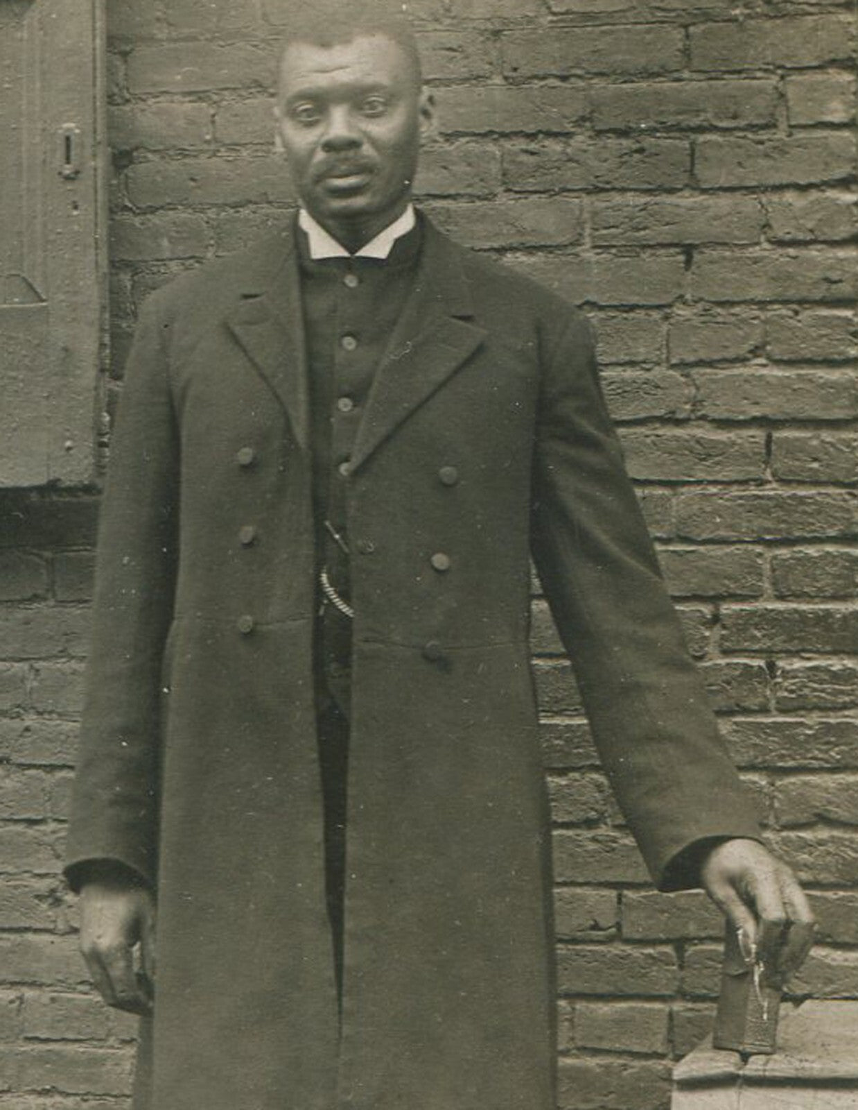 AFRICAN AMERICAN MAN. REV. F.W, COLLINS, STANDING POSE W/BIBLE. PHOTO POSTCARD.