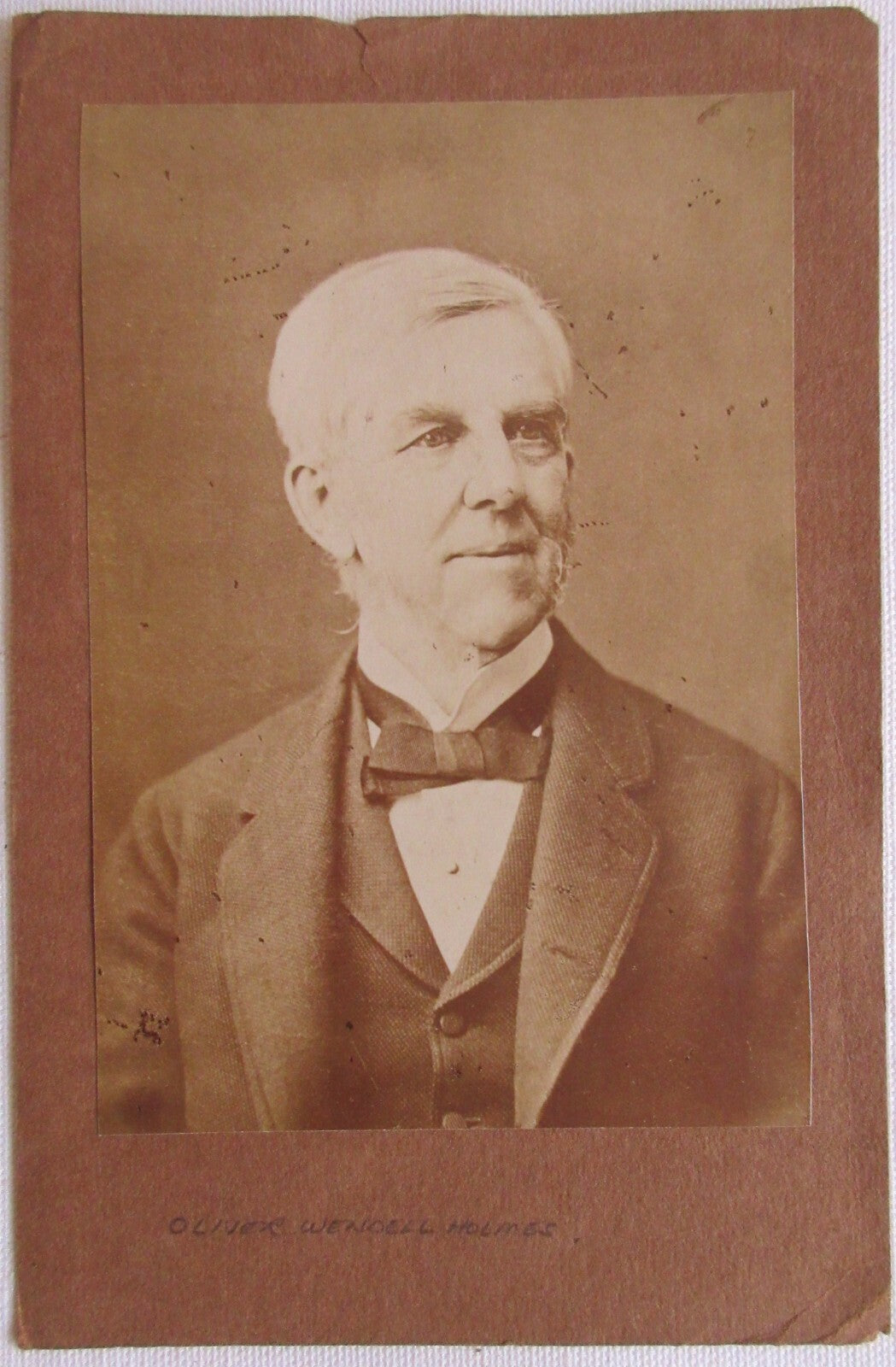 SUPREME COURT JUSTICE HOLMES, ALBUMEN 5.25X3.5 ON 7X4.5 PAGE.