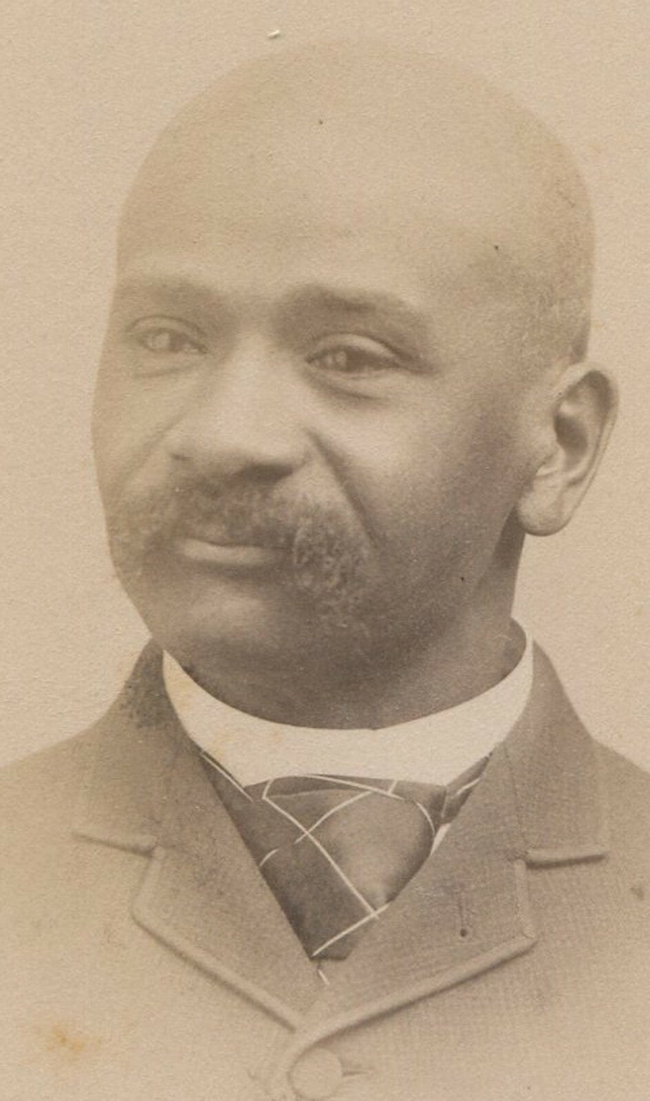 AFRICAN AMERICAN MAN, BALD W/THICK MUSTACHE. CABINET CARD.