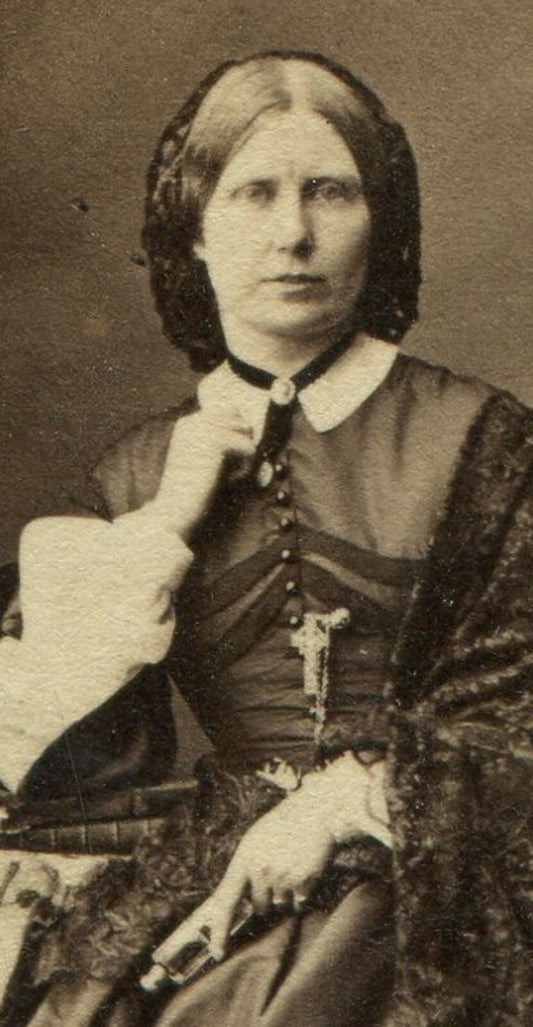 WOMAN, SERIOUS EXPRESSION, HAND AT CHIN. CDV. BAYSWATER, ENGLAND.