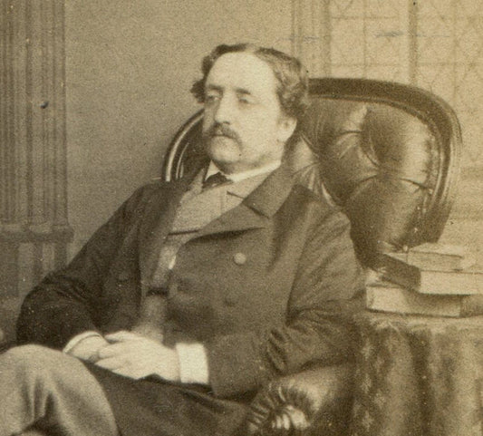DISTINGUISHED GENTLEMAN SEATED POSE, BOOKS ON TABLE. CDV. LONDON, ENGLAND.