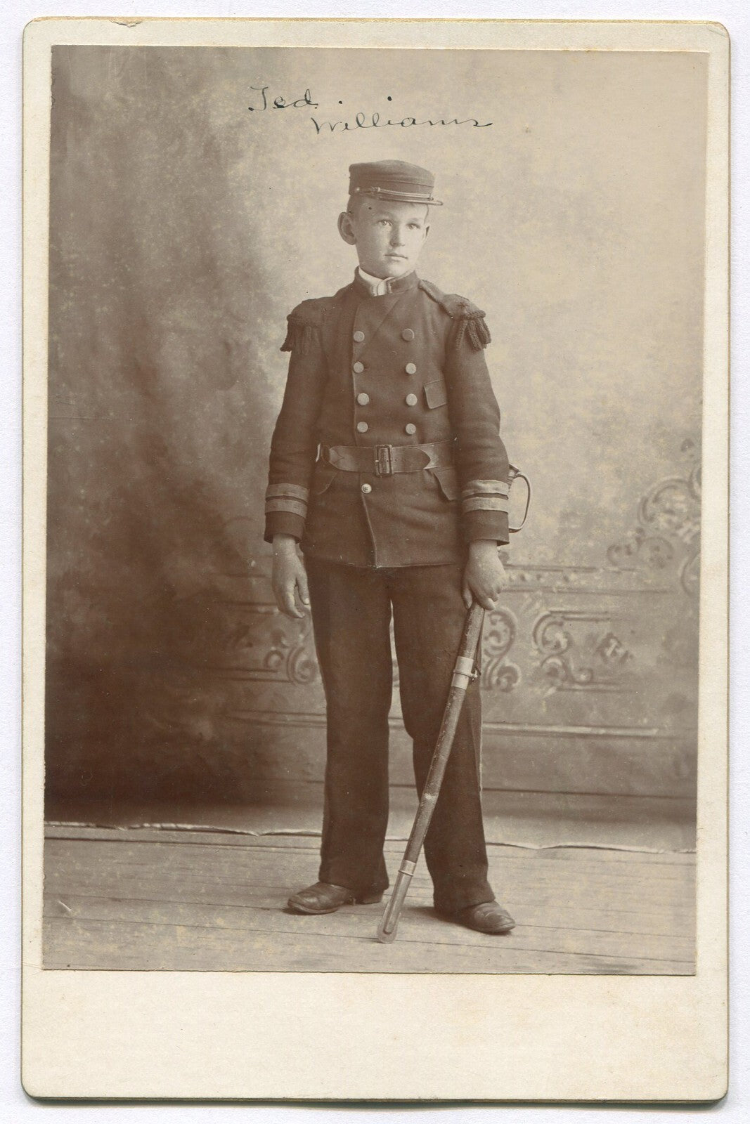 BOY WITH SABER IN MILITARY ACADEMY UNIFORM. CABINET CARD.