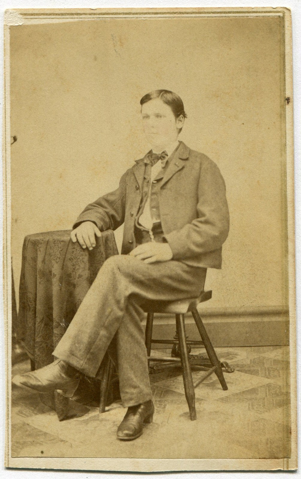 SLICK HAIRED YOUNG MAN, SEATED POSE. CDV.