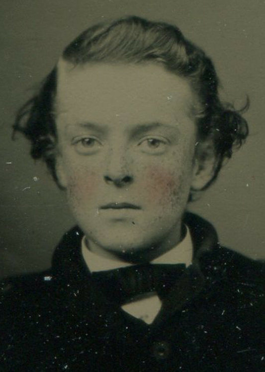 BOY, FROZEN IN TIME, SEEKS THE FUTURE. TINTED TINTYPE, PERIOD PAPER MAT.