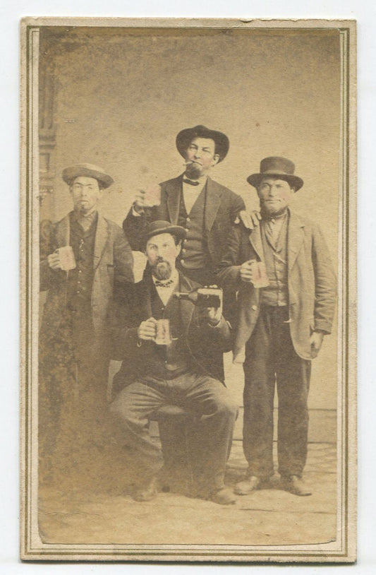 MEN IN HATS POSED HOLDING BEER MUGS, BOTTLE. TINTED CDV. COSHOCTON, OHIO.