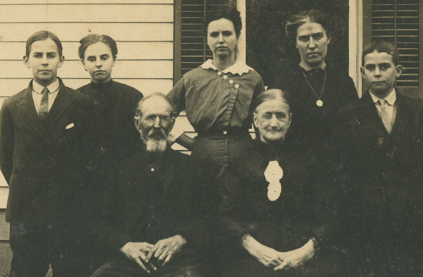 FAMILY PHOTO, MULTI GENERATIONAL. 5X7 SILVER PRINT ON 7X9 INCH CARD.