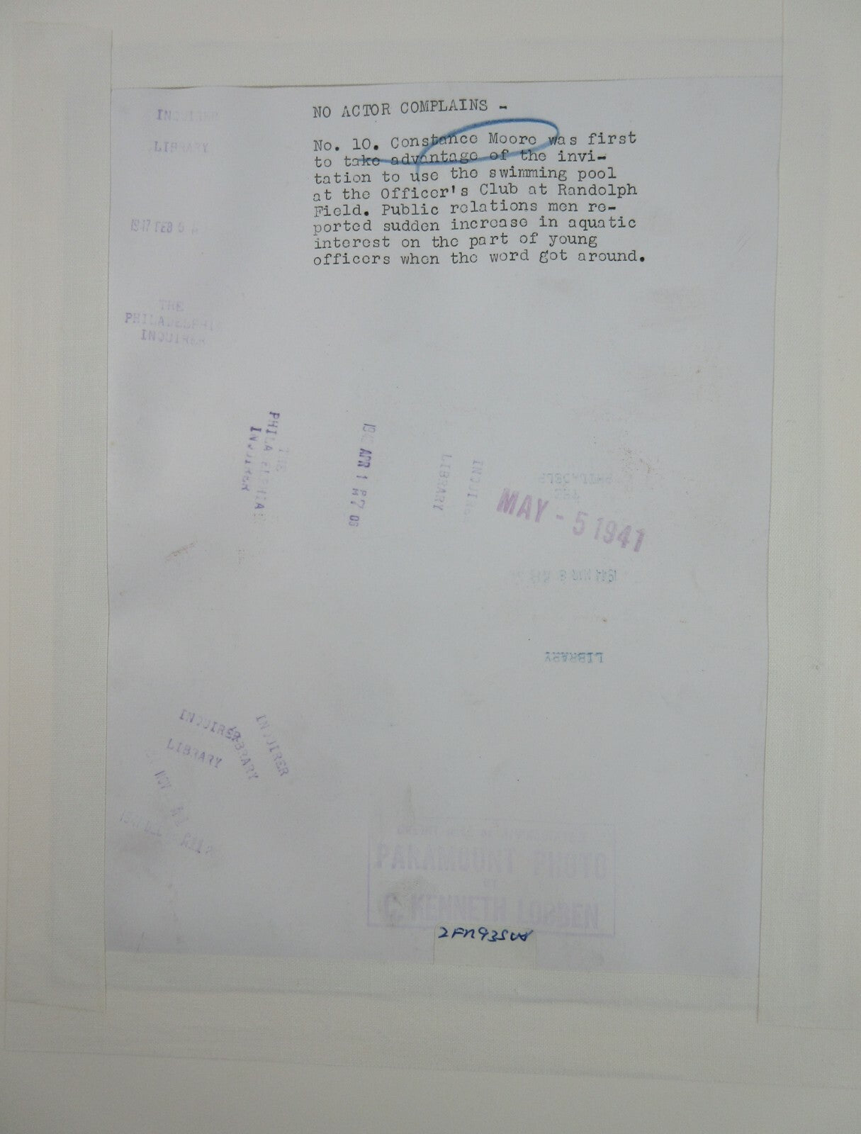 ACTRESS CONSTANCE MOORE SITTING ON DIVING BOARD. 8X10 B&W IN 11X14 ARCHIVAL MAT.