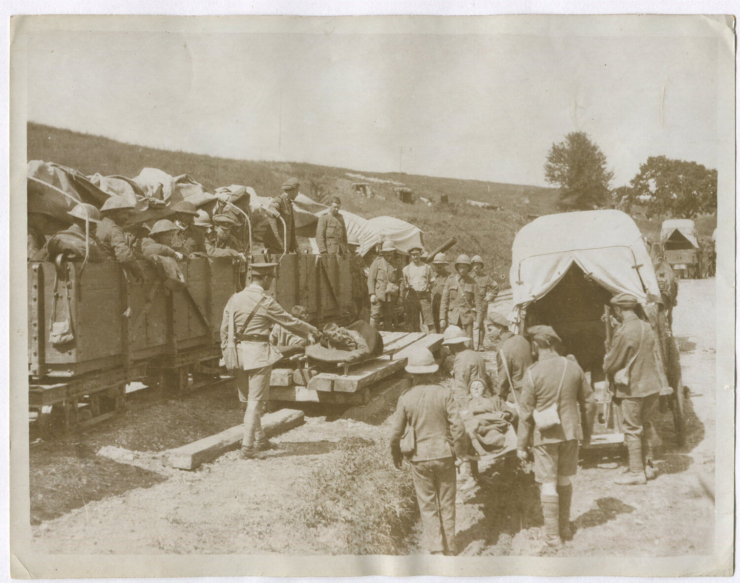 WOUNDED BEING SENT TO HOSPITAL ON LIGHT RAIL. WWI. (8X10 REPRINT)