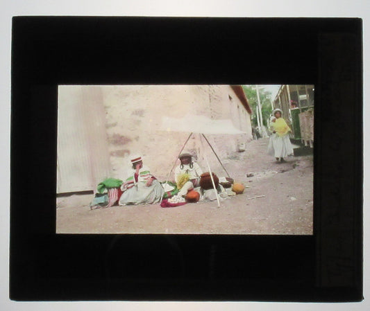 TAKEO WOMEN. PEAU. HAND COLORED PHOTO ON GLASS. TINTED LANTERN SLIDE.