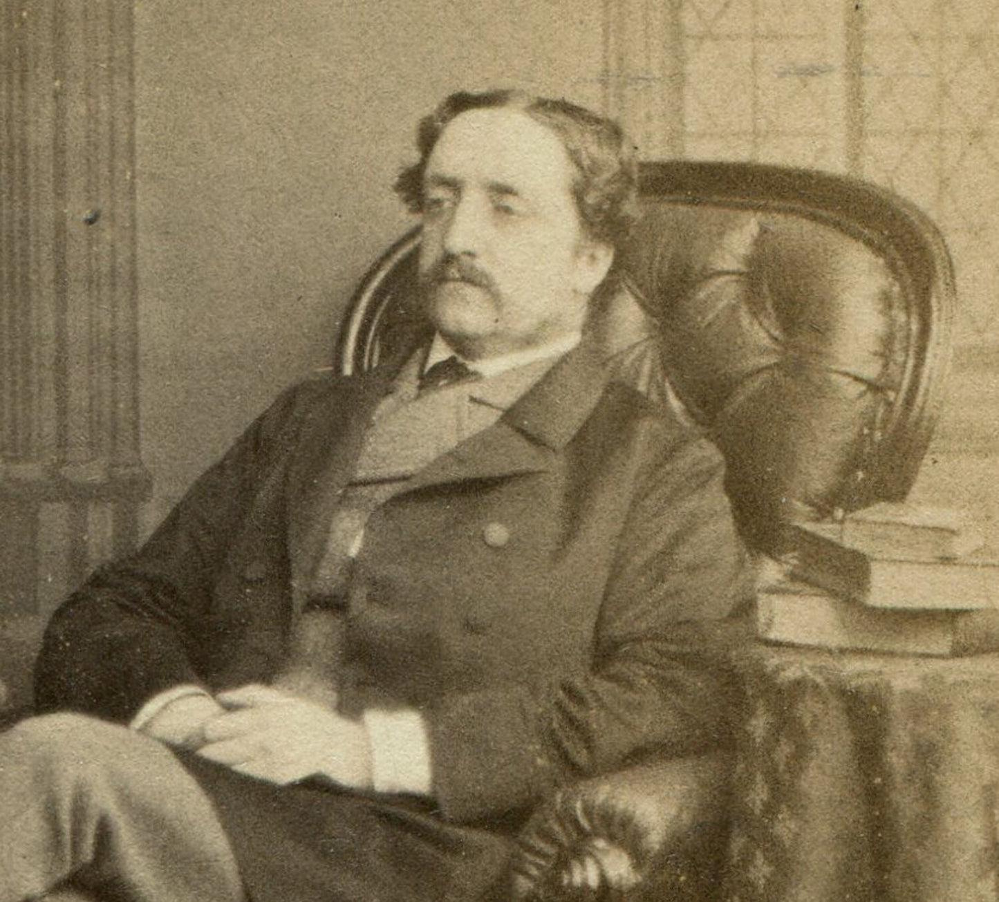 DISTINGUISHED GENTLEMAN SEATED POSE, BOOKS ON TABLE. CDV. LONDON, ENGLAND.