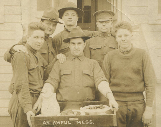 U.S. ARMY, PHOTO POSTCARD. SOLDIERS COMPLAINING ABOUT, "AN AWFUL MESS". FOOD.